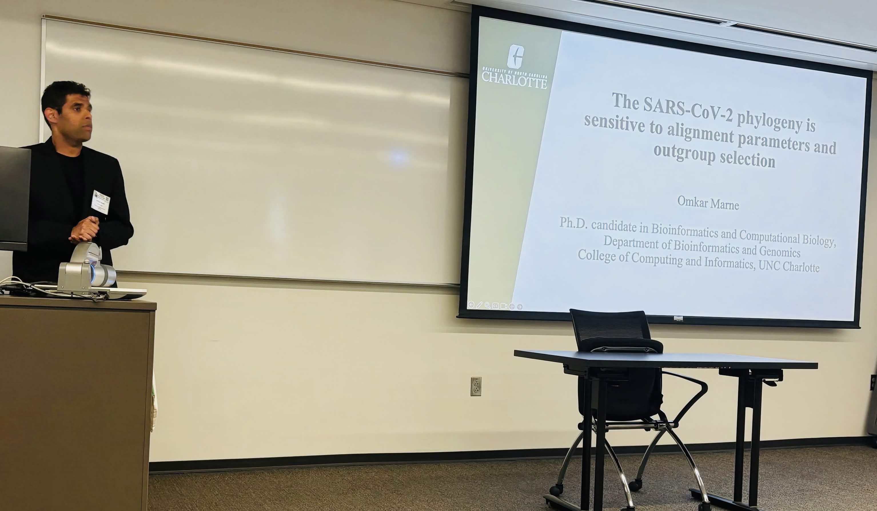 Omkar Marne presents 'The SARS-CoV-2 phylogeny is sensitive to alignment parameters and outgroup selection' at the Charlotte Regional Biomedical Symposium on September 14, 2026.